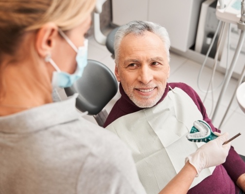 Senior dental patient getting impressions taken for dentures