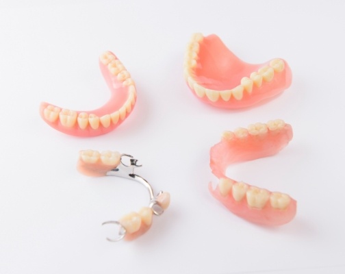 Two full dentures and two partials