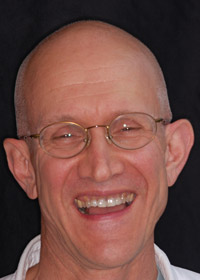man with glasses before