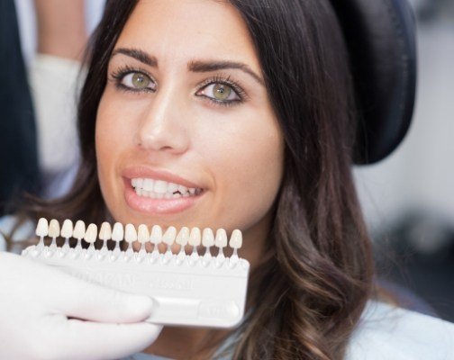 Woman in dental chair being fitted for dental veneers in Brookline