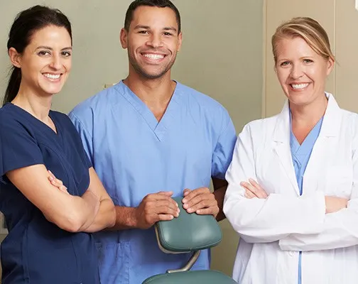 Dental team smiling